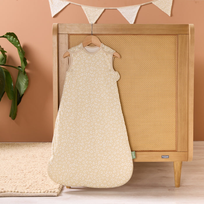 Love Cats baby sleep bag hanging in a nursery, styled with soft bunting and coordinating bedding for a calm, cohesive look