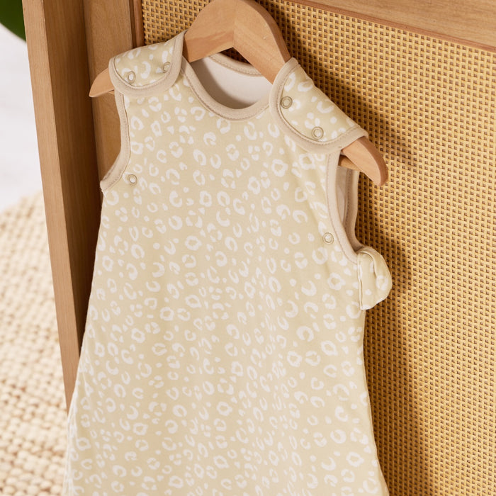 Side view of Love Cats baby sleep bag highlighting a soft cotton finish, shoulder poppers and elegant hand-drawn woodland motifs