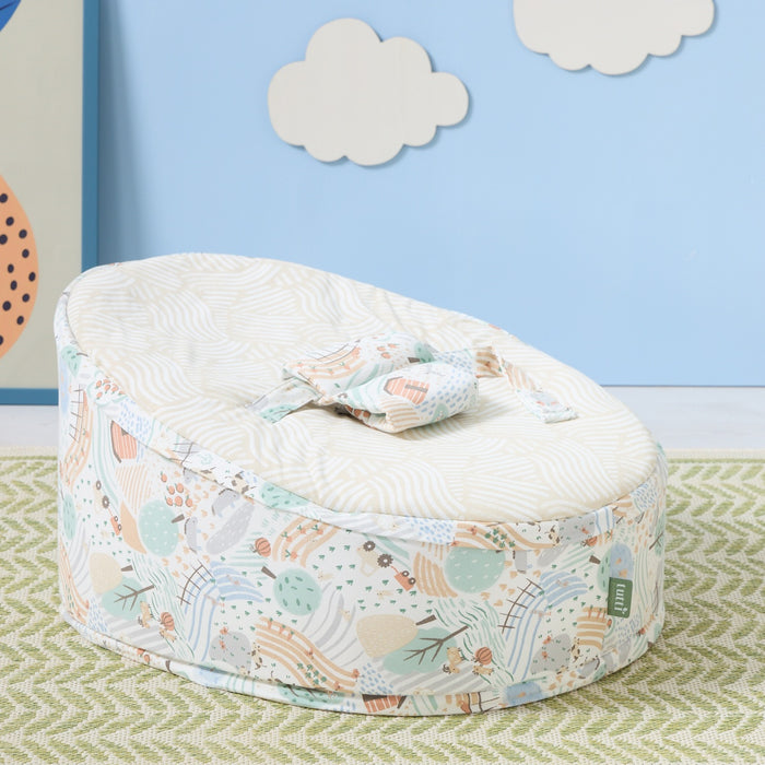 Good Life beanbag in playful nursery setting with patterned base and cream top, designed for cosy comfort and gentle support