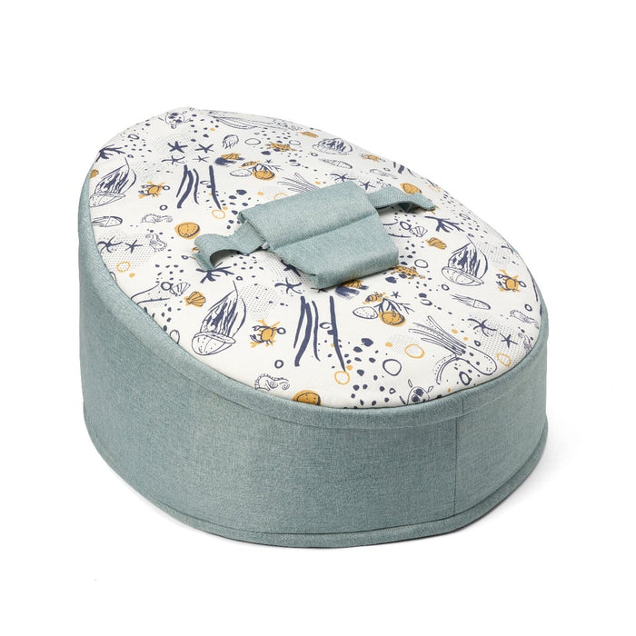 Cutout view of the Our Planet baby bean bag, showcasing the soft curved design and playful sea-themed white print top
