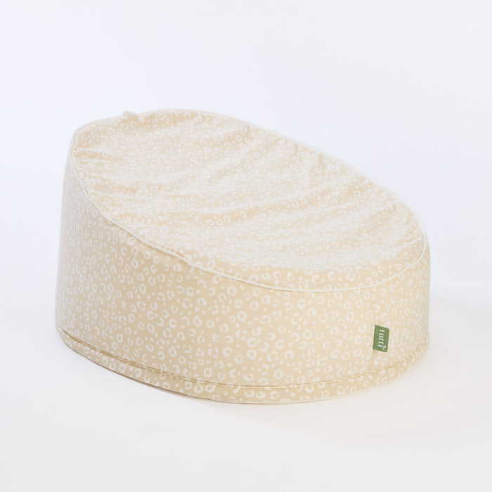 Cutout of the Love Cats baby beanbag in beige leopard print, showing soft rounded shape and removable top for everyday comfort