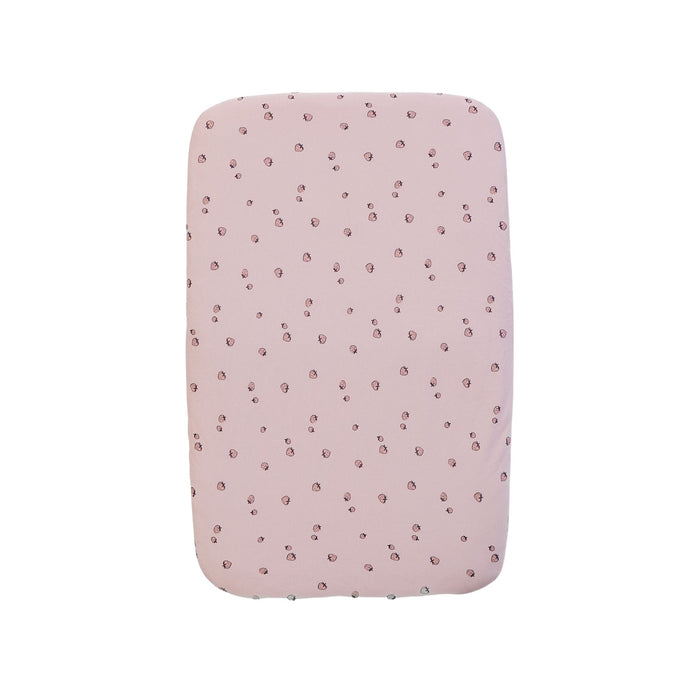Tiny Tails strawberries-patterned pink bedside crib fitted sheets on a white background
