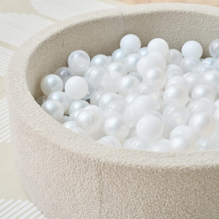 Bola Baby Ball Pit in Mushroom - close up image of ball pit and boucle fabric texture