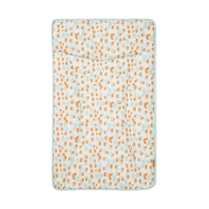changing mat featuring a leopard inspired spot design