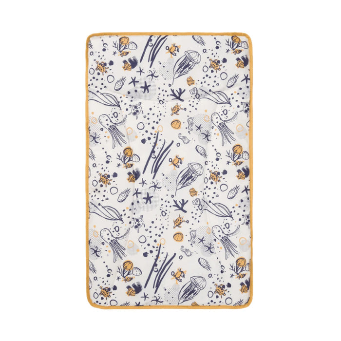 changing mat in ocean white showing a sea life inspired design