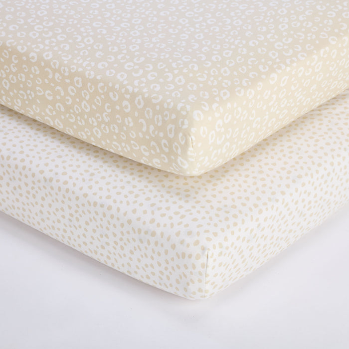 Love Cats fitted sheets stacked to show oat speckle and leopard prints, highlighting soft cotton fabric and snug fitted corners.