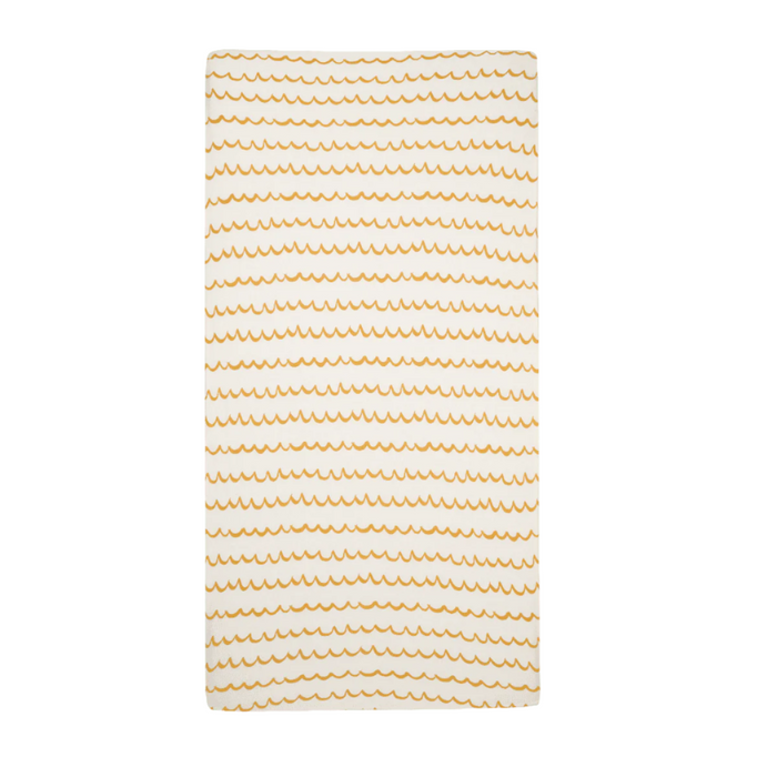 Cot bed fitted sheet in Our Planet orange wave stripe design, made from breathable organic cotton with snug, secure fit