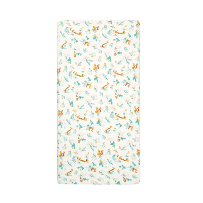 Cot bed fitted sheet from the Run Wild collection, featuring playful safari animals and foliage print in warm tones for a fun nursery look