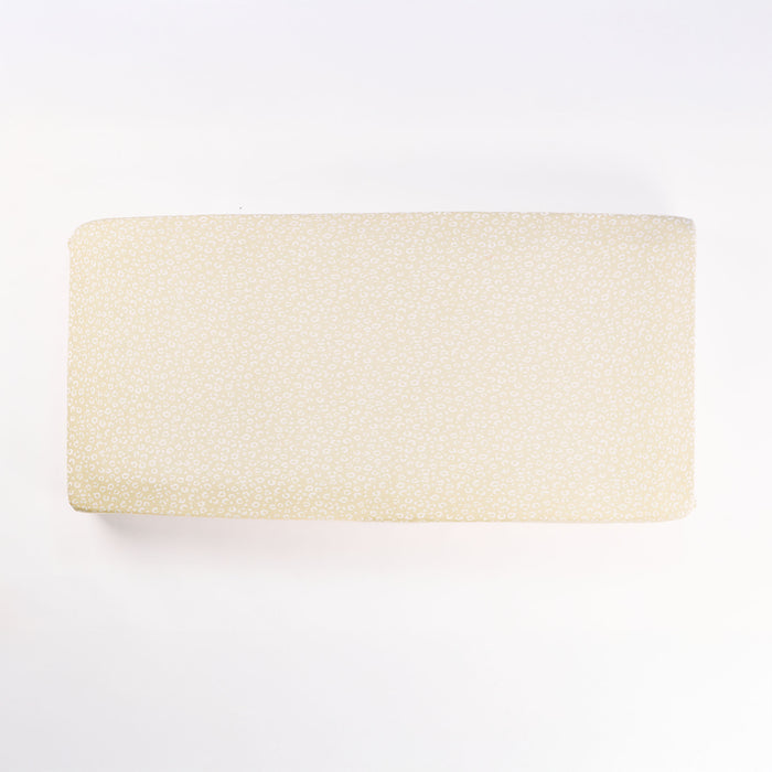 Love Cats cot bed fitted sheet in neutral leopard print, displayed flat to show soft fabric and full elasticated edging.