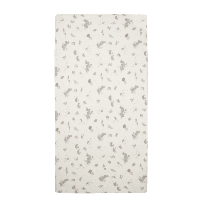 Cocoon cot bed fitted sheet with rabbit and woodland print, designed in calming neutral tones for a cosy nursery sleep space
