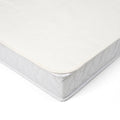 Corner close-up of the waterproof cotton mattress protector for cot or cot bed, showing plush quilted surface and secure edge stitching