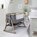 CoZee Air Bedside Crib in Oak and Charcoal with breathable mesh sides and drop-down panel