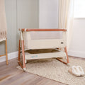 CoZee Air Bedside Crib in Scandinavian Walnut/Ecru - lifestyle image in room setting, showing the crib with rocking bars attached