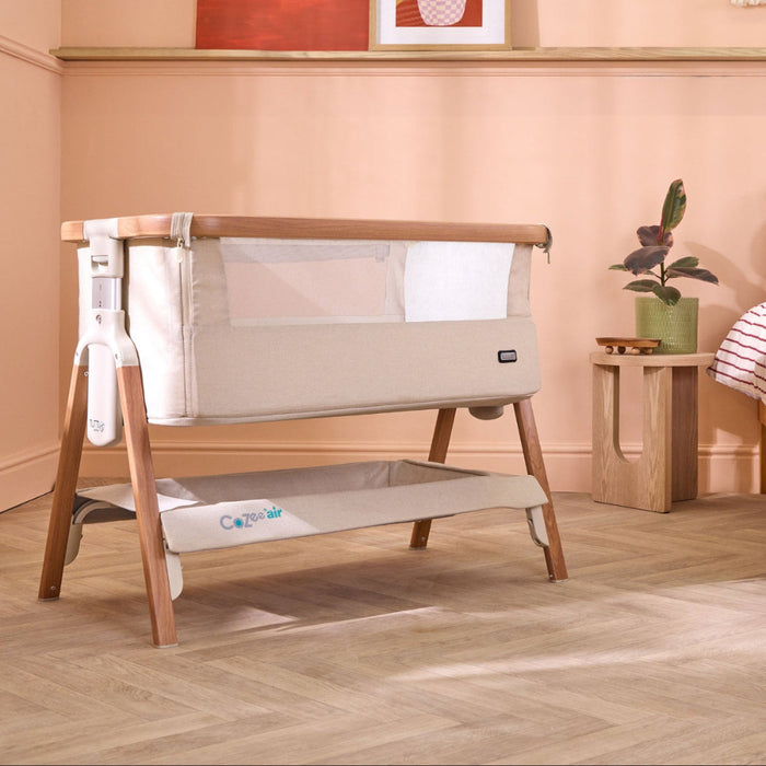 CoZee Air Bedside Crib in Scandinavian and Ecru – stylish bedroom setup with mesh panel and oak-effect frame
