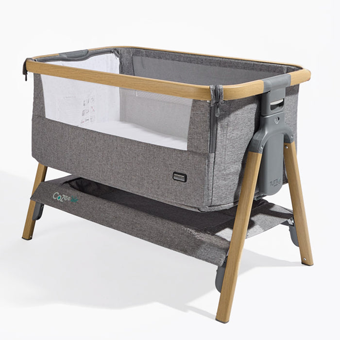 Angled cutout of CoZee Air in Oak and Charcoal – shows soft charcoal fabrics, mesh sides, and integrated rocking legs