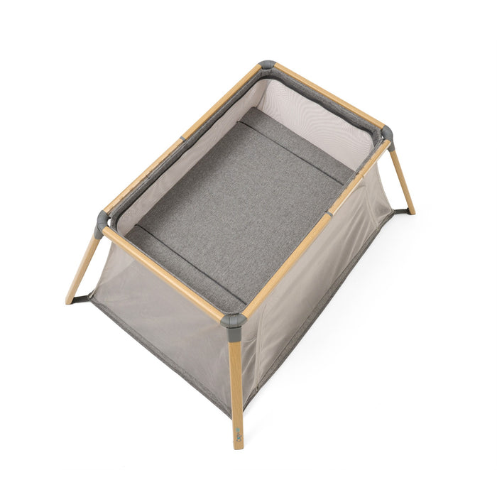 CoZee Go 3-in-1 Bassinet Travel Cot Playpen in Oak and Charcoal – Aerial view of the spacious cot mattress for restful sleep on the go