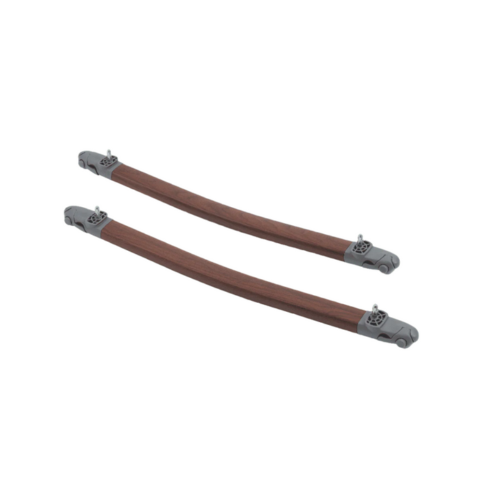 Cutout image of the walnut CoZee Luxe rocking bars, compatible with all CoZee cribs, featuring integrated wheels and locking mechanism