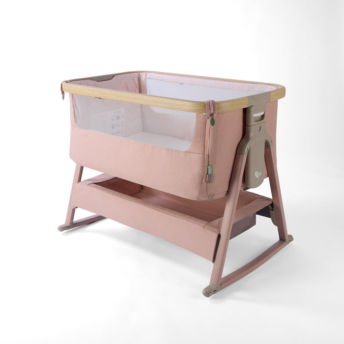 CoZee Air 2 bedside crib in blush with rocking bars, storage, 6 height positions in a white background