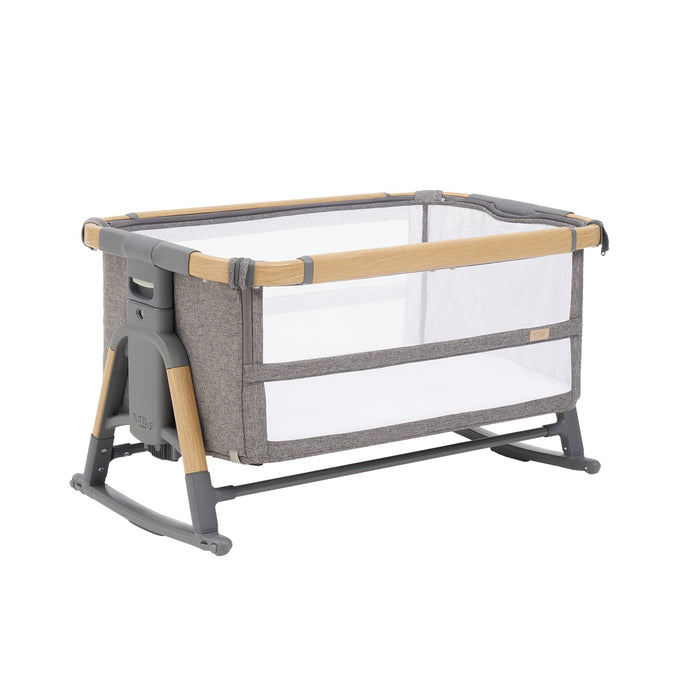 Cutout view of the CoZee bassinet in oak and charcoal with curved rocking bars attached, ideal for gently soothing your newborn