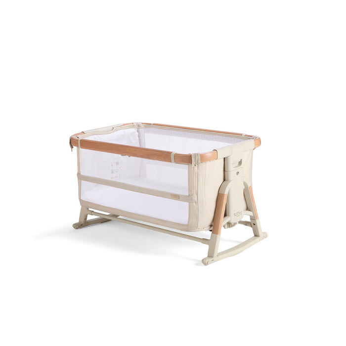 Cutout view of the CoZee Scandi in bassinet mode with raised sides, mesh panels and wooden legs for modern nursery style