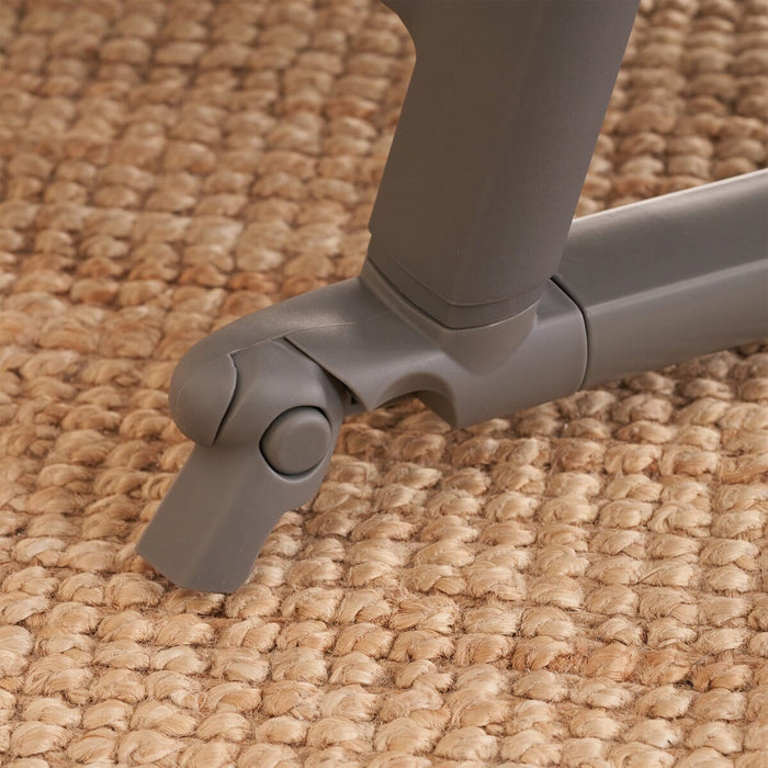 Close-up of the CoZee bassinet stabiliser foot in charcoal, highlighting the rocking bar locking mechanism for added stability and safety