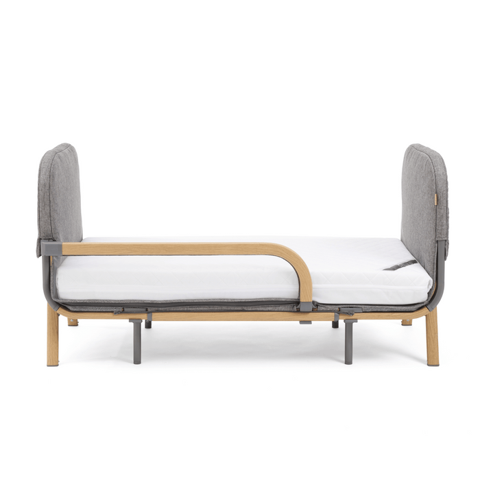CoZee XL Toddler Bed in Oak and Charcoal, offering a safe transition from crib to bed