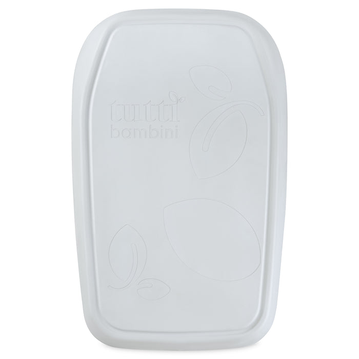 Back view of the Cushi mini baby changing mat in cloud, showing the subtle Tutti Bambini branding and gently contoured design.