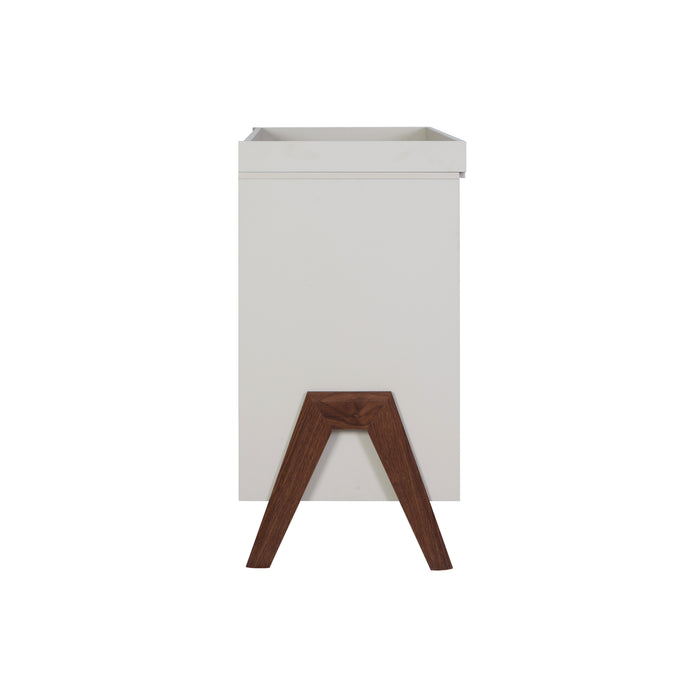 Fuori Chest Changer in White Sand and Warm Walnut, combining elegant design with essential nappy changing functionality