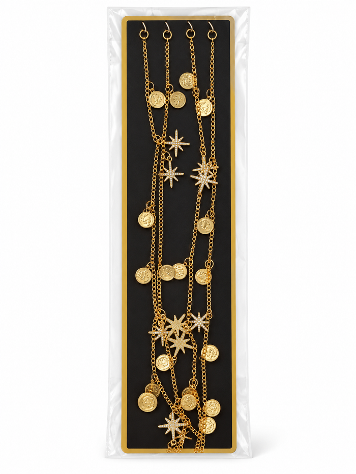 Gold-tone hair chains with coin and star charms detail
