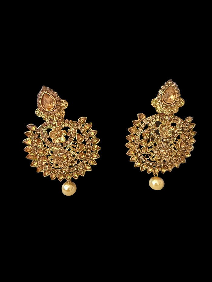 Gold-tone Kundan pearl drop earrings detail view