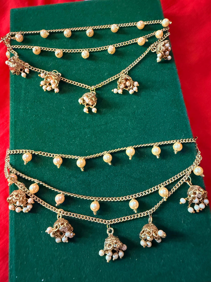Gold-tone pearl jhumka hair chain extension – layered chain and pearl-style detail