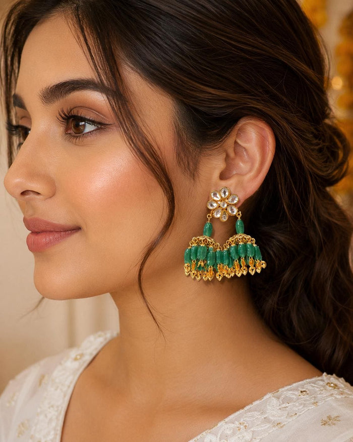 Green Kundan and beaded jhumka earrings