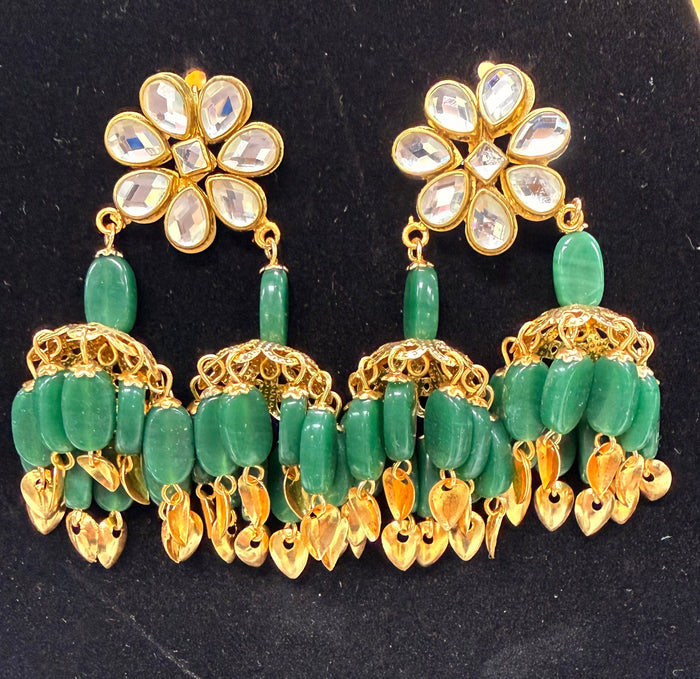 Green Kundan and beaded jhumka earrings – stone and bead detail
