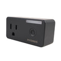 A black power outlet with the word HYDROS on it. This TAS HYDROS WiFi Smart Plug is WiFi controllable and can be easily managed using the HYDROS controller.