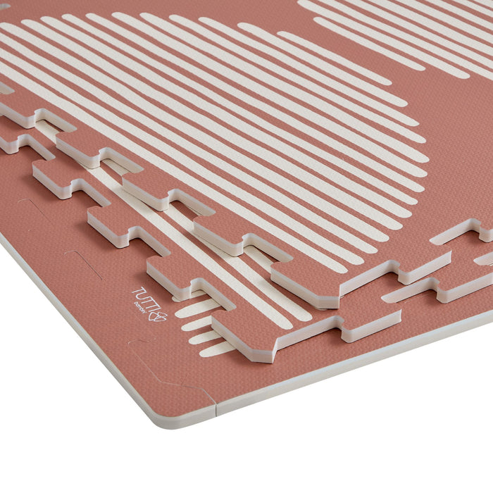 Detailed view of the edges of the Infinity Playmat in Orbital Pink.