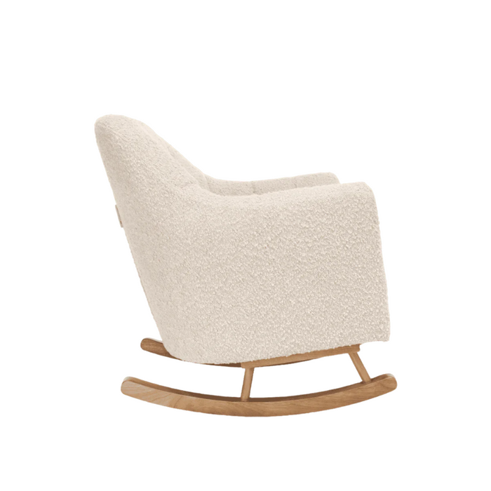Side profile of the Jonah Mini Me rocking chair in boucle mushroom with curved backrest and smooth wooden rockers