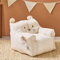 Luca Leopard beanbag chair styled in a warm-toned nursery with bunting and plush toy