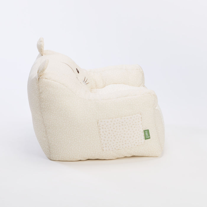 Side view of the Luca Leopard beanbag chair in soft cream fabric with subtle leopard print, showing handy side pocket