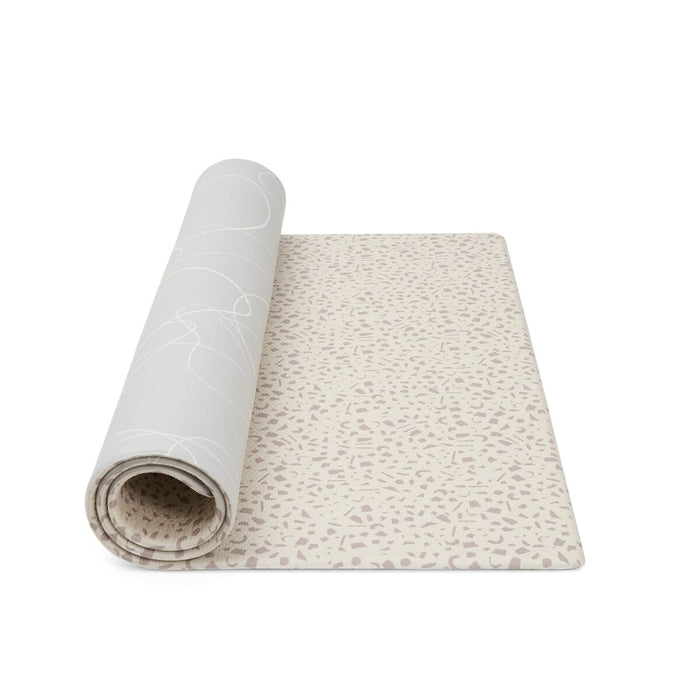 Rolled Bubble Terrazzo play mat showing its soft cushioned texture and reversible neutral designs for flexible playroom styling