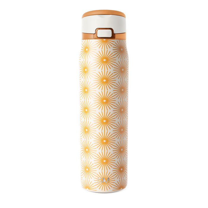 Cream cylindrical bottle with repeating geometric pattern in warm golden orange on neutral background