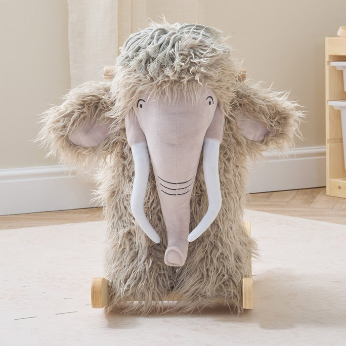 Front view of Mimi the Mammoth rocking toy with soft fur texture, friendly expression and wide wooden rockers for balance