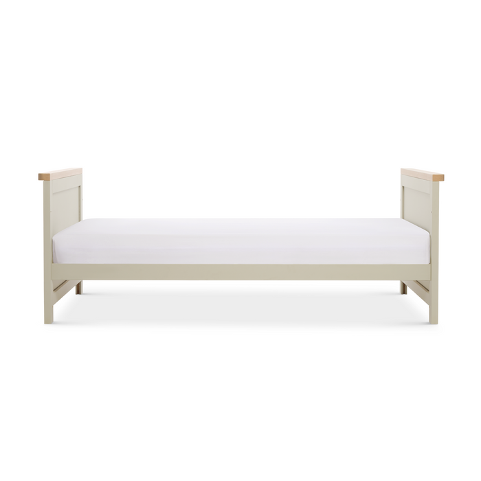 Misha Cot Bed in Mushroom colour, shown in toddler bed mode on a white background