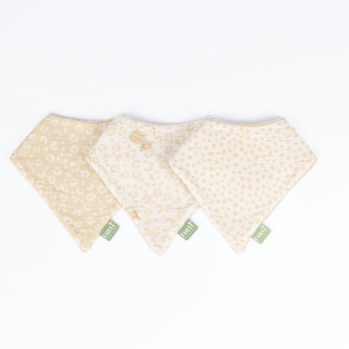 Three beige baby bibs with a subtle animal print on a white background