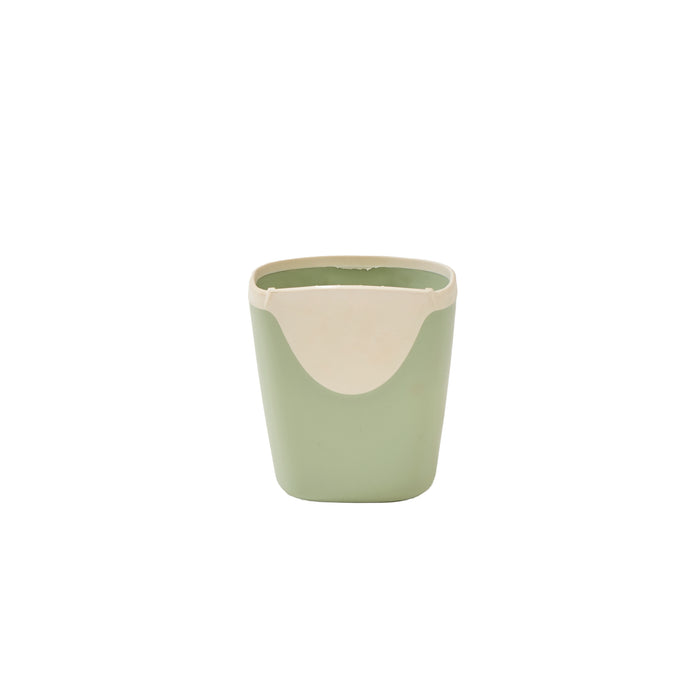 Front view of the Nati bath jug in green, featuring soft curves and an easy-grip design, in a white background