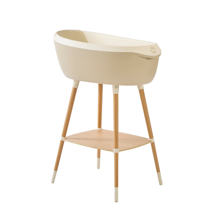 Image of the Nati jug in beige placed neatly within the Nati Baby Bath, showcasing its perfect fit and convenient storage design.