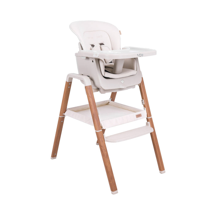 Product view of the Nova evolutionary highchair in Scandinavian Walnut/Ecru with adjustable tray, safety harness, and storage basket, set against a white background.