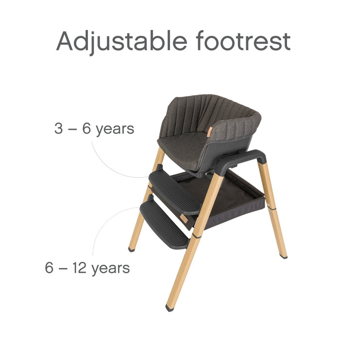 Side view of Nova Evolutionary Highchair in Grey/Oak highlighting the adjustable footrest with two height positions suitable for children aged 3–6 years and 6–12 years for ergonomic comfort.