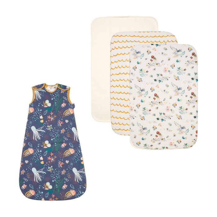 Our Planet set of baby bedding with animal patterns on a white background