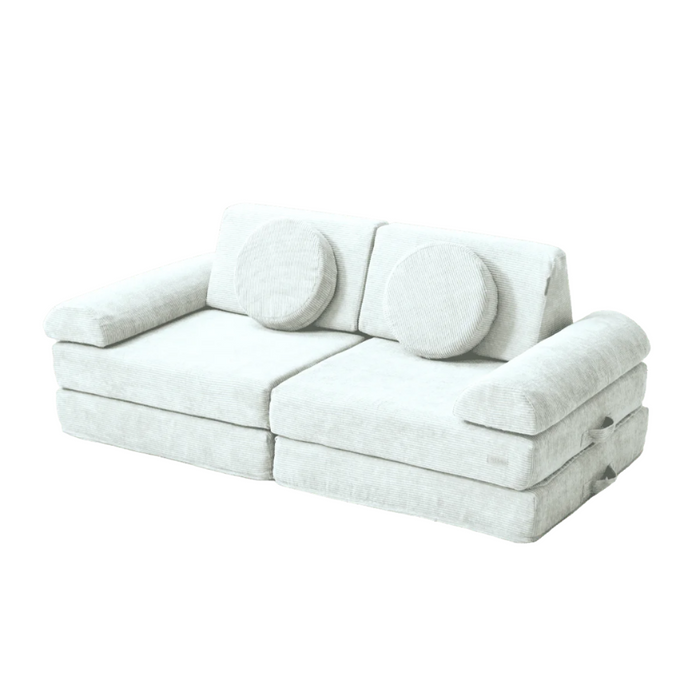 Cutout view of the Playrama Montessori kids play sofa in soft sea mist finish, with modular cushions, arms, and backrests for imaginative play