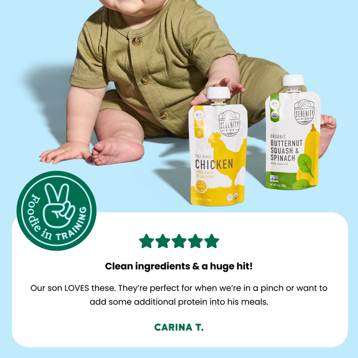 Baby holding two organic baby food packages with a review quote on a light blue background